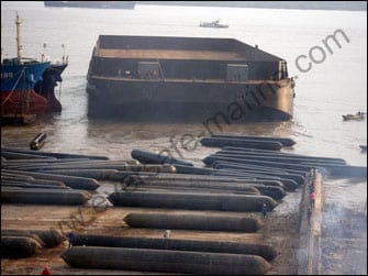 River Barge Launching with evergreen airbags