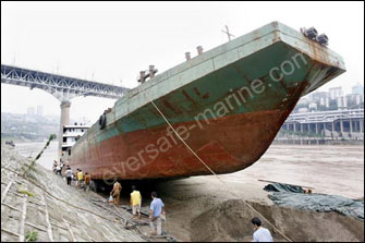 Salvage airbags used to grounded cargo ship in Jialing River
