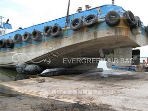 Tug Boat Landing with Evergreen Airbags