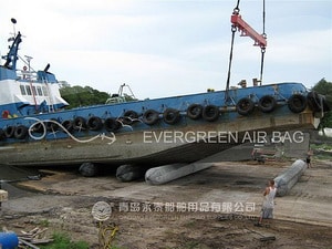 Tug Boat Landing with Evergreen Airbags
