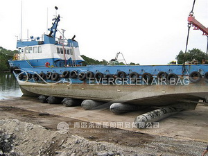 Tug Boat Landing with Evergreen Airbags