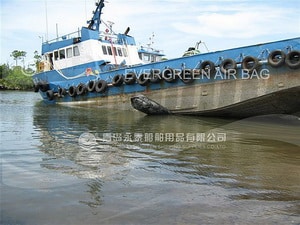 Tug Boat Landing with Evergreen Airbags