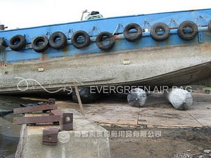 Tug Boat Landing with Evergreen Airbags