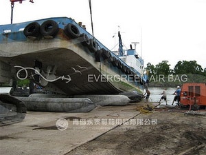 Tug Boat Landing with Evergreen Airbags